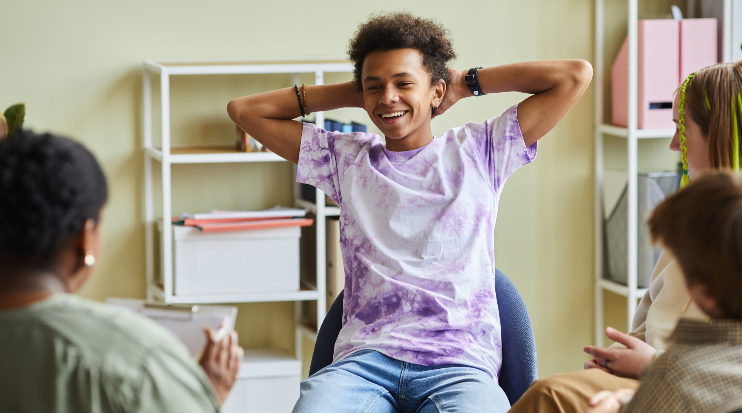 Military teenager attending group therapy